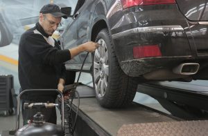 Car Maintenance in a Garage | Breast Cancer Car Donations