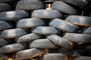 Old Car Tires Piled Up | Breast Cancer Car Donations