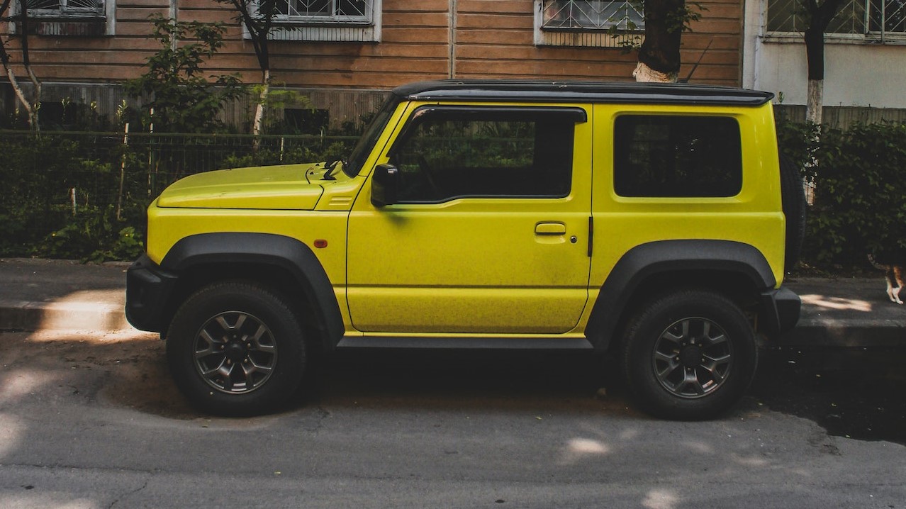 Yellow SUV Parked on Roadside | Breast Cancer Car Donations