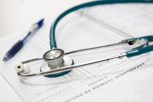 Stethoscope Placed on a Table | Breast Cancer Car Donations