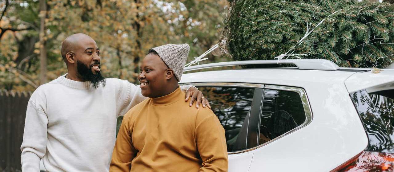 Dad and Son with White Car | Breast Cancer Car Donations