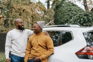 Dad and Son with White Car | Breast Cancer Car Donations