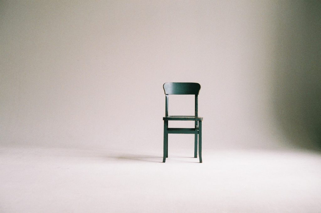 Chair with a Minimalist Background | Breast Cancer Car Donations
