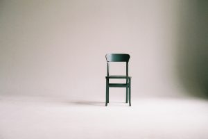 Chair with a Minimalist Background | Breast Cancer Car Donations
