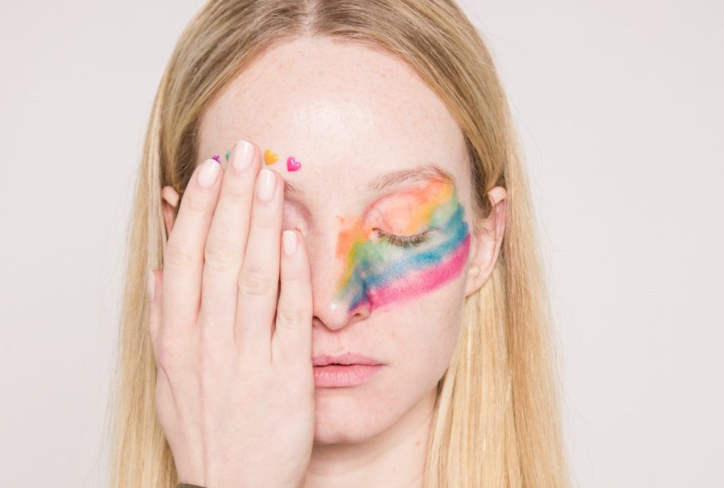 Woman with Rainbow Make Up | Breast Cancer Car Donations