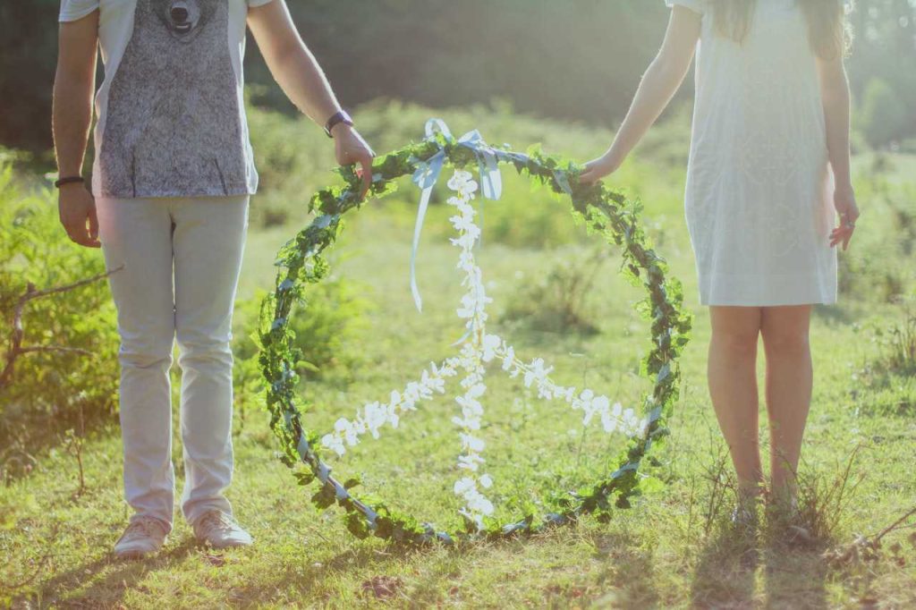 People Holding Peace Symbol | Breast Cancer Car Donations