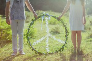 People Holding Peace Symbol | Breast Cancer Car Donations