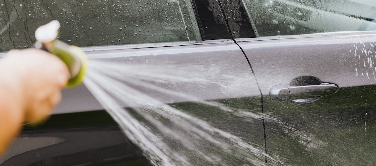 Person Washing a Car | Breast Cancer Car Donations