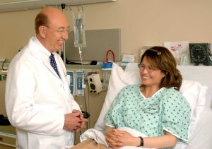 Woman Talking to a Doctor | Breast Cancer Car Donations