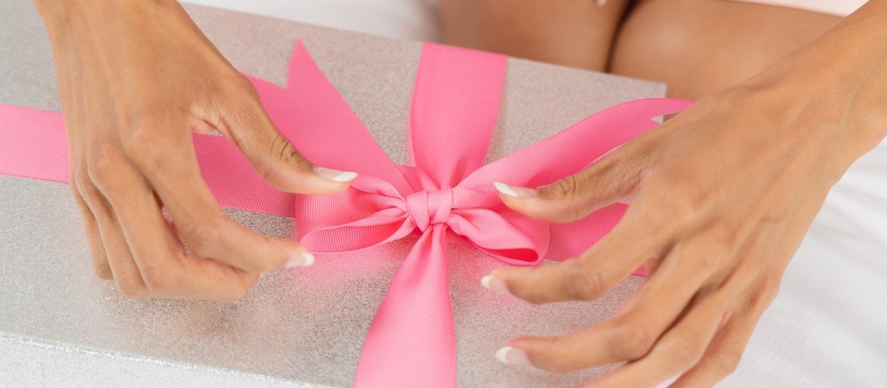 Pink Ribbon in a Gift Box | Breast Cancer Car Donations