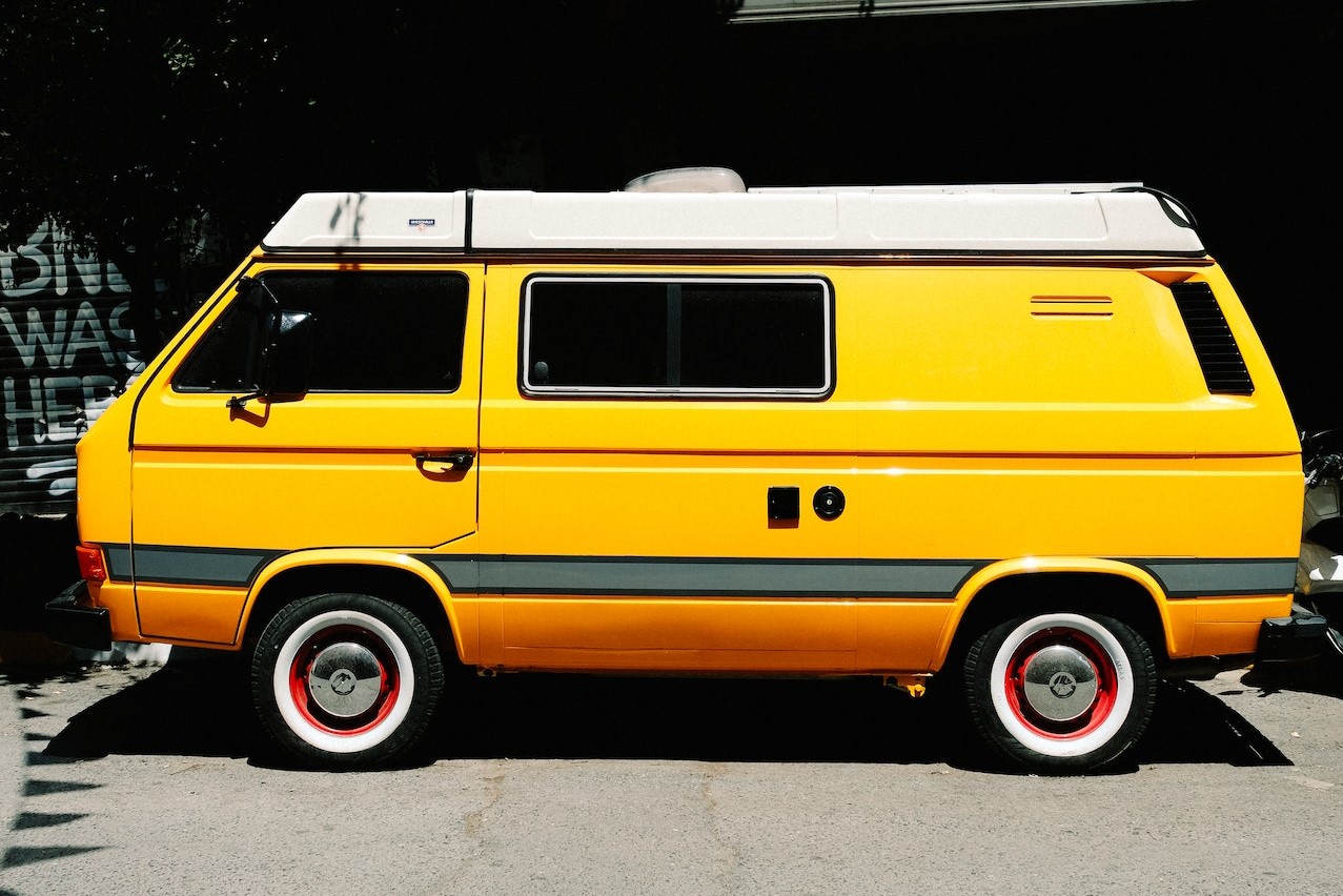 View of a Parked Yellow Van | Breast Cancer Car Donations