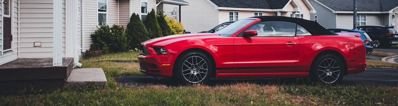 Red Ford Mustang on a Driveway | Breast Cancer Car Donations