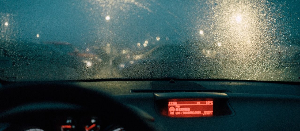 Photo of Windshield During Rainy Weather | Breast Cancer Car Donations