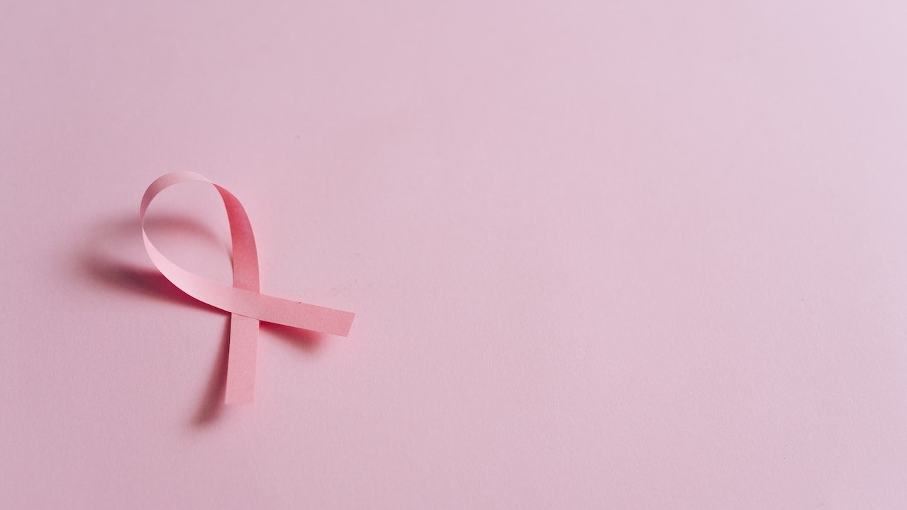 Pink Ribbon on Pink Surface| Breast Cancer Car Donations