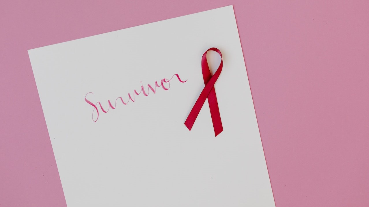 White Paper on Pink Background | Breast Cancer Car Donations