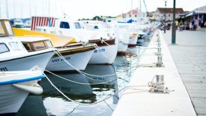 Boats Near Dock | Breast Cancer Car Donations