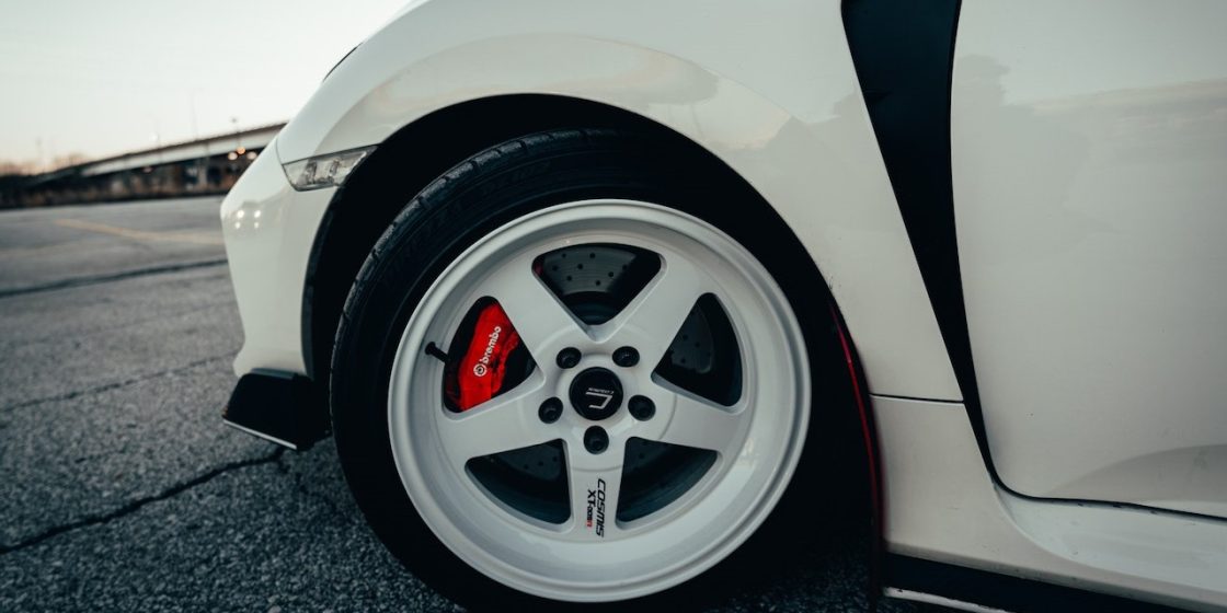 Close-Up Shot of Black and White Tire | Breast Cancer Car Donations