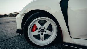 Close-Up Shot of Black and White Tire | Breast Cancer Car Donations