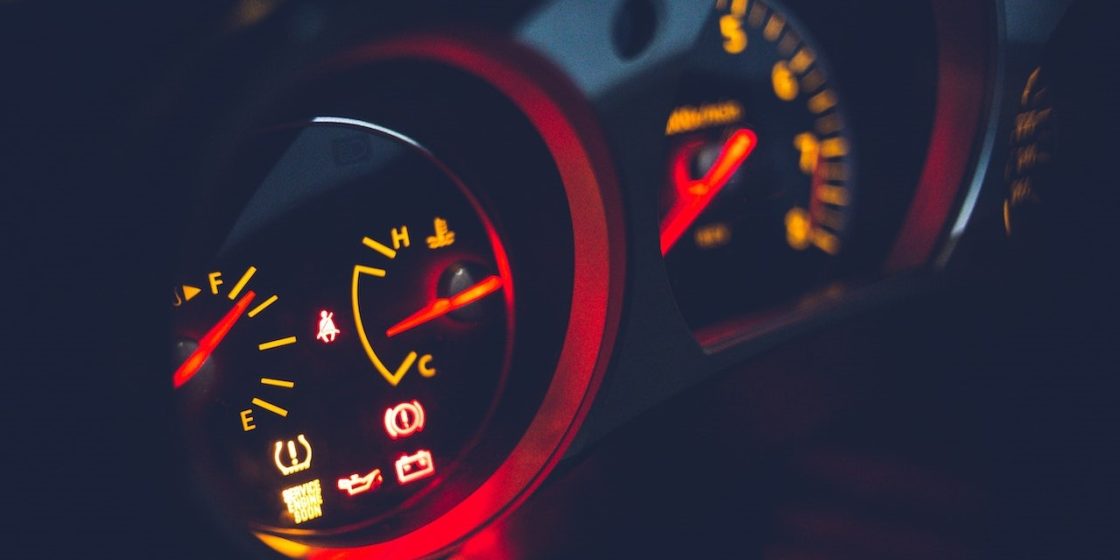 Fuel gauge on dashboard in contemporary automobile | Breast Cancer Car Donations