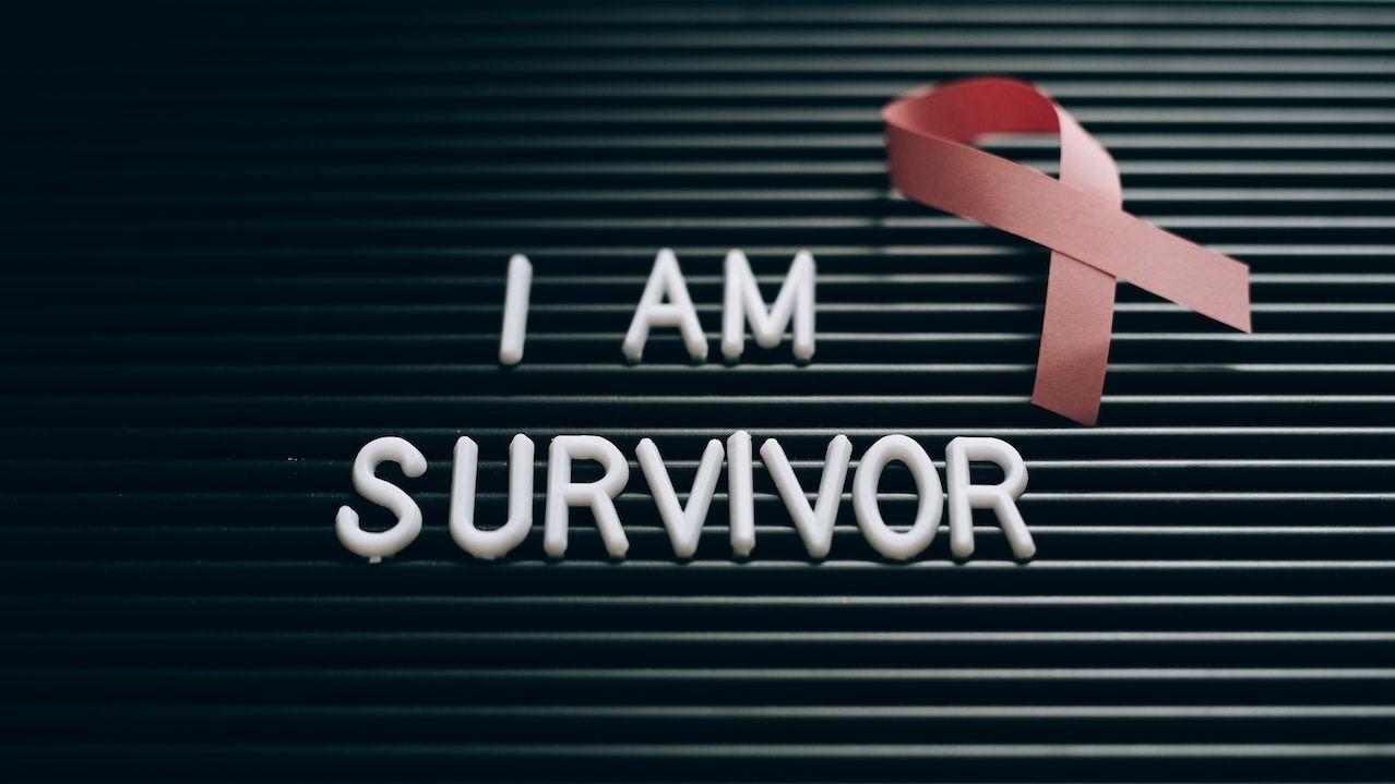 I Am Survivor Note on a Letterboard | Breast Cancer Car Donations