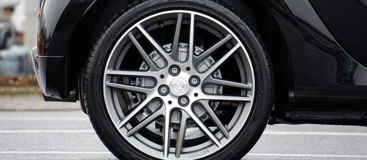 Close-up Photograph of Chrome Vehicle Wheels | Breast Cancer Car Donations