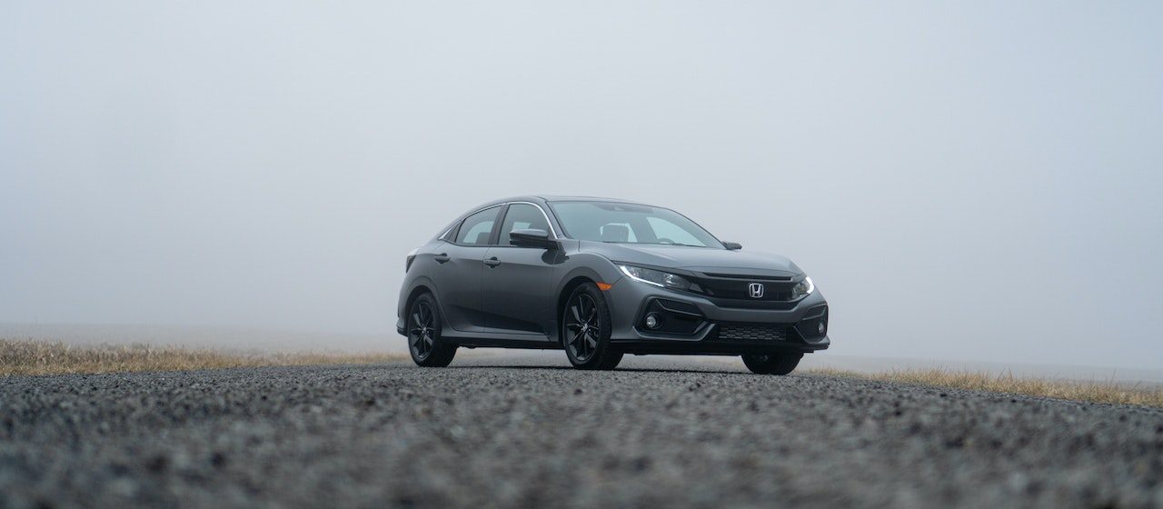 Honda Car Parked on the Road | Breast Cancer Car Donations