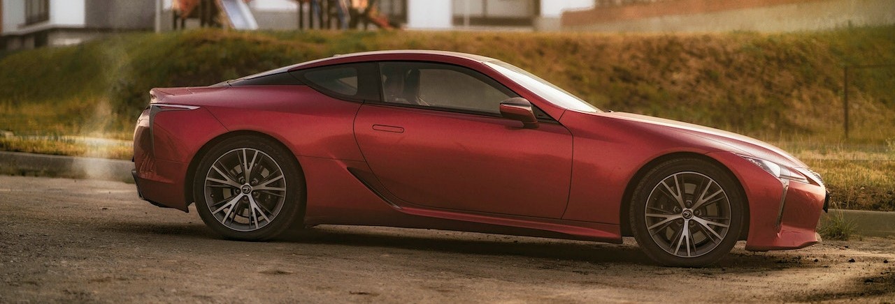 Photo Of Red Sports Car | Breast Cancer Car Donations