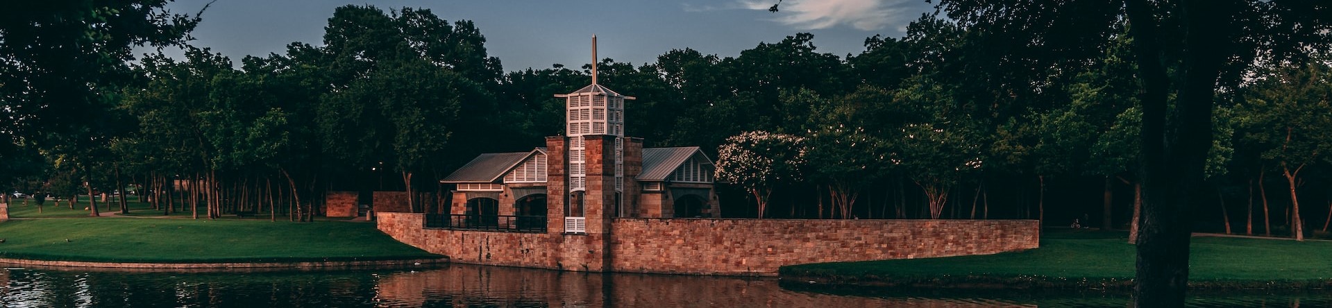 A shot of the building for shade across the water | Breast Cancer Car Donations