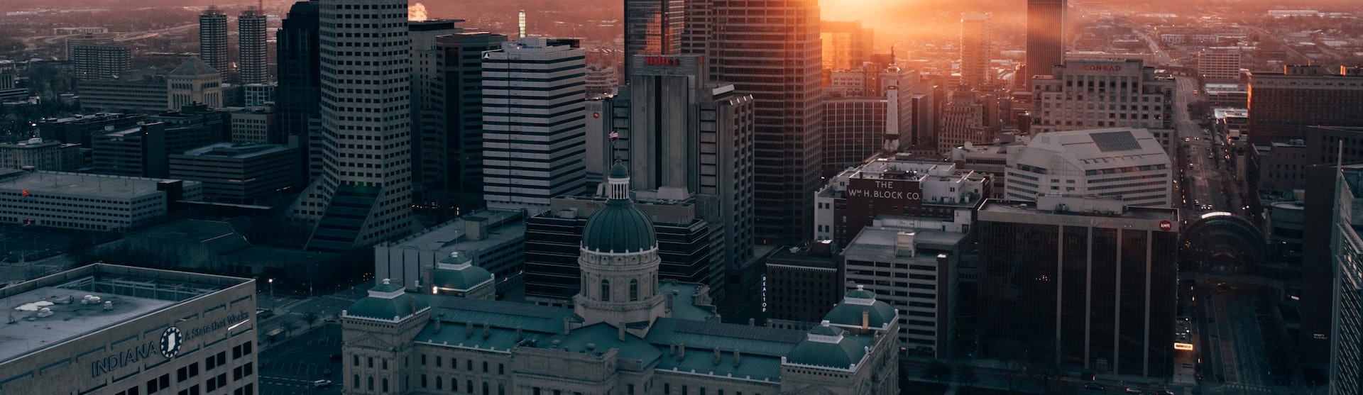 Airial view of buildings in Indianapolis at sunset | Breast Cancer Car Donations