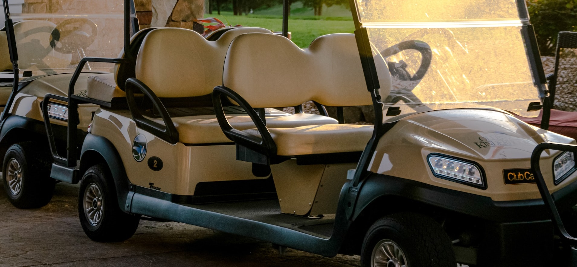Biege Golf cart parked | Breast Cancer Car Donations