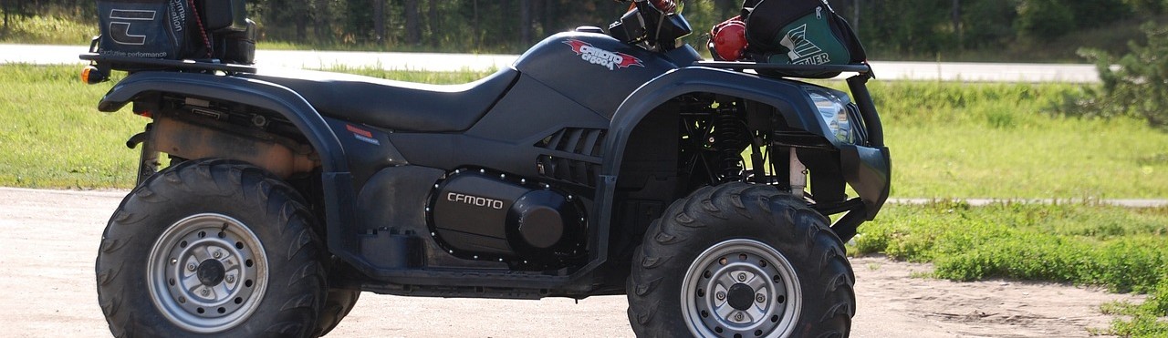 Black cfmoto atv parked | Breast Cancer Car Donations