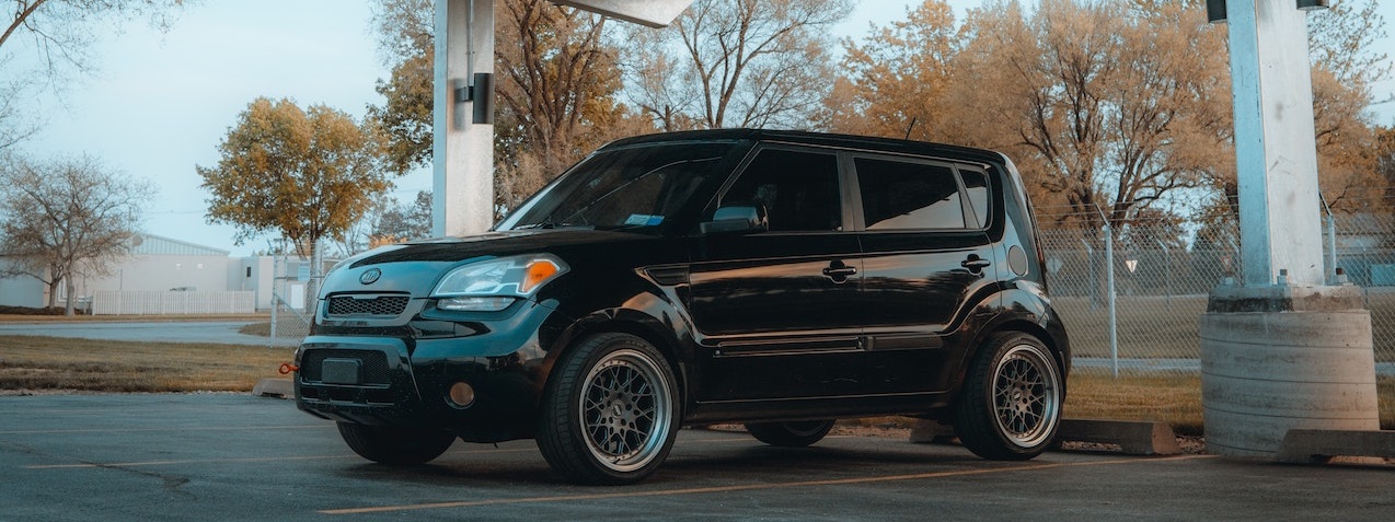 Black honda SUV parked | Breast Cancer Car Donations