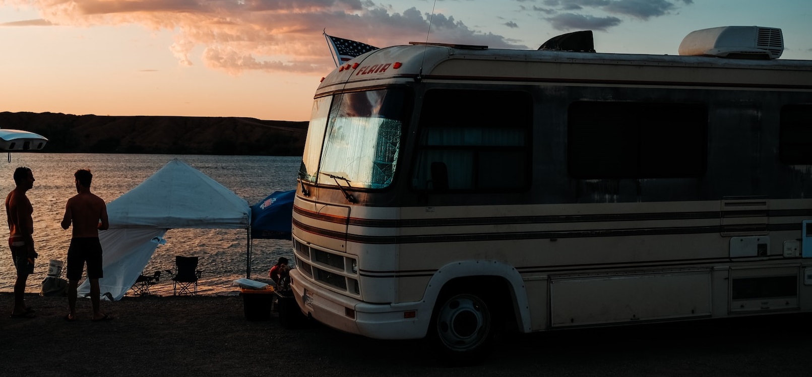 Class A Motorhome with US flag | Breast Cancer Car Donations