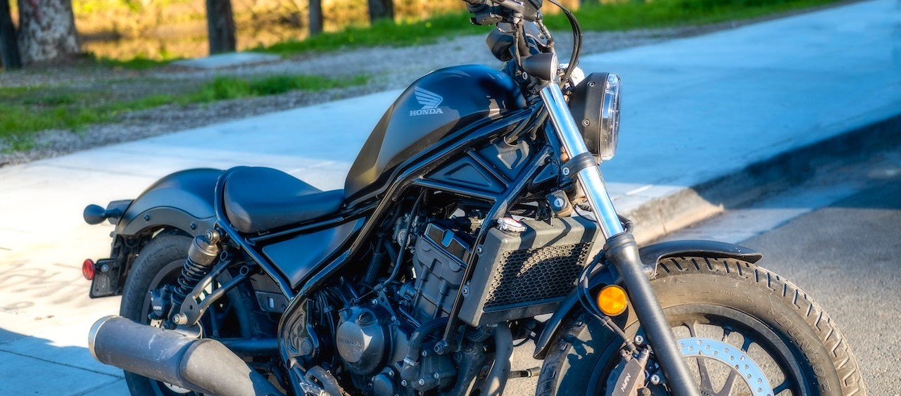 Close-Up Shot of Black Motorcycle | Breast Cancer Car Donations
