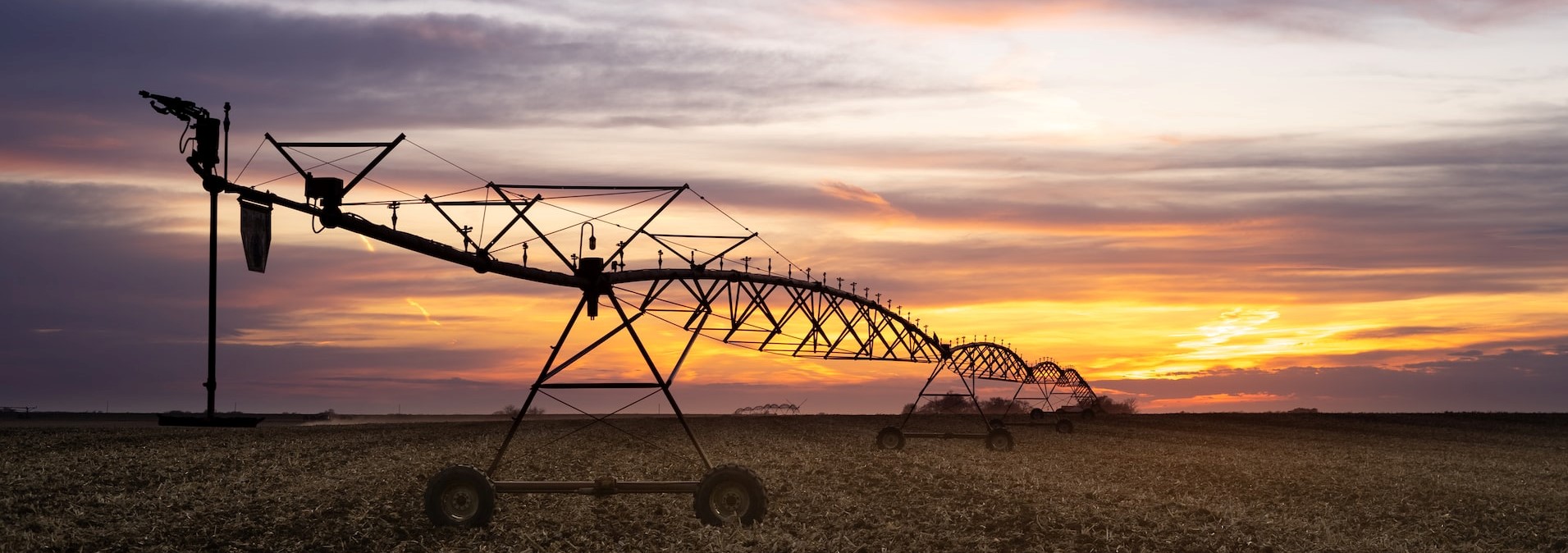 Farm equipment at sunset | Breast Cancer Car Donations