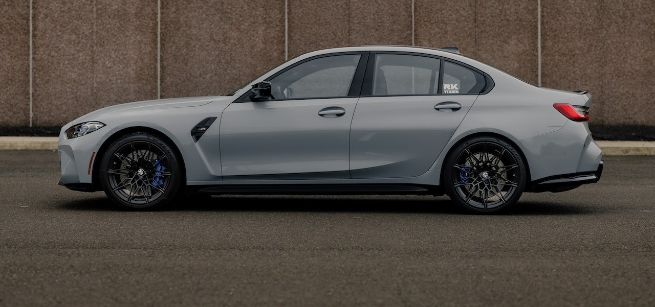 Gray Coupe Beside Brown Wall | Breast Cancer Car Donations