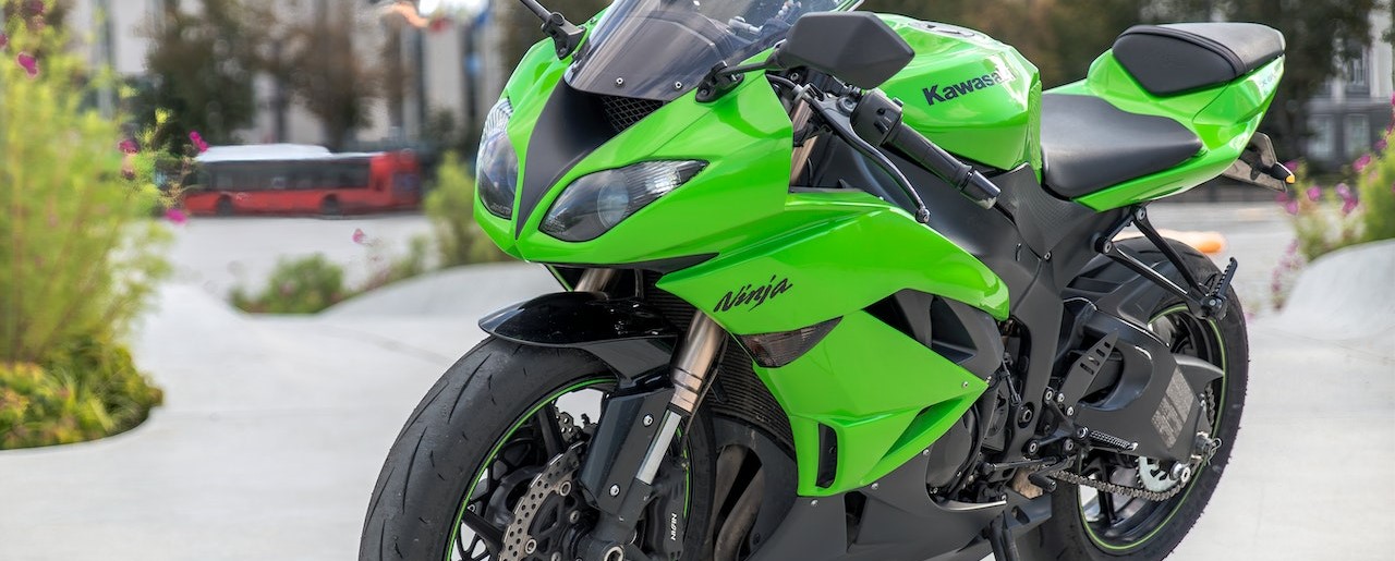Green and Black Sports Bike | Breast Cancer Car Donations