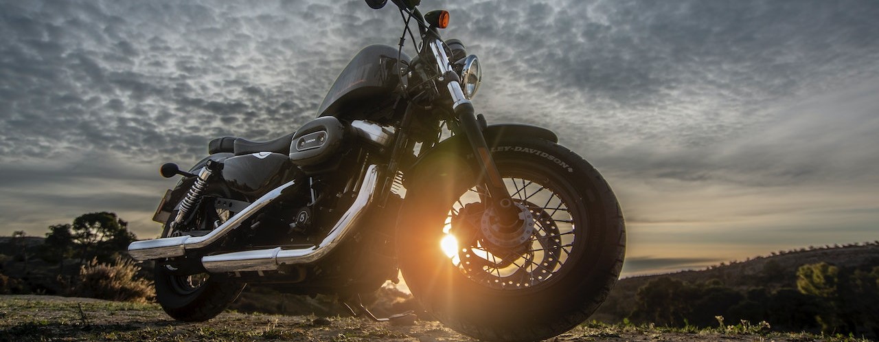 Low Angle Photo of Black Harley Davidson Forty-Eight 1200 | Breast Cancer Car Donations
