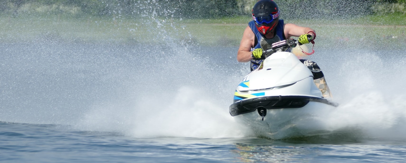 Man Riding a Jetski | Breast Cancer Car Donations