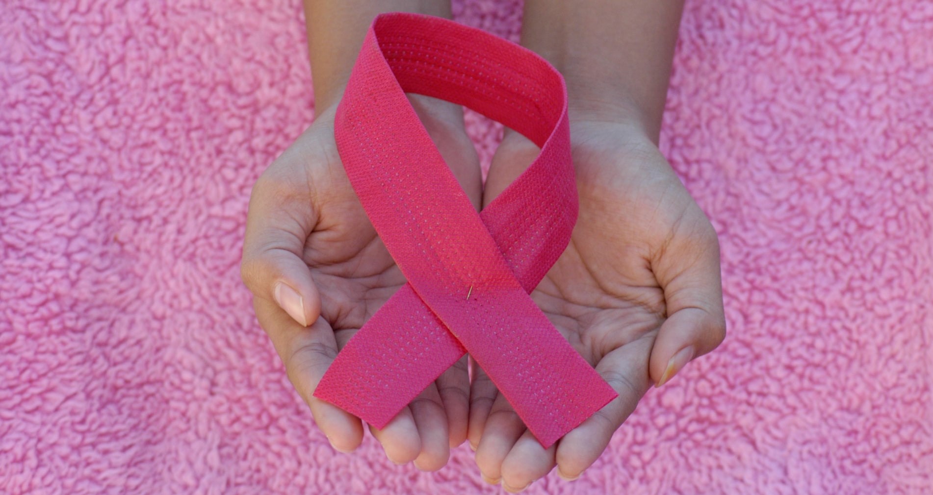 Pink Ribbon in Hand | Breast Cancer Car Donations