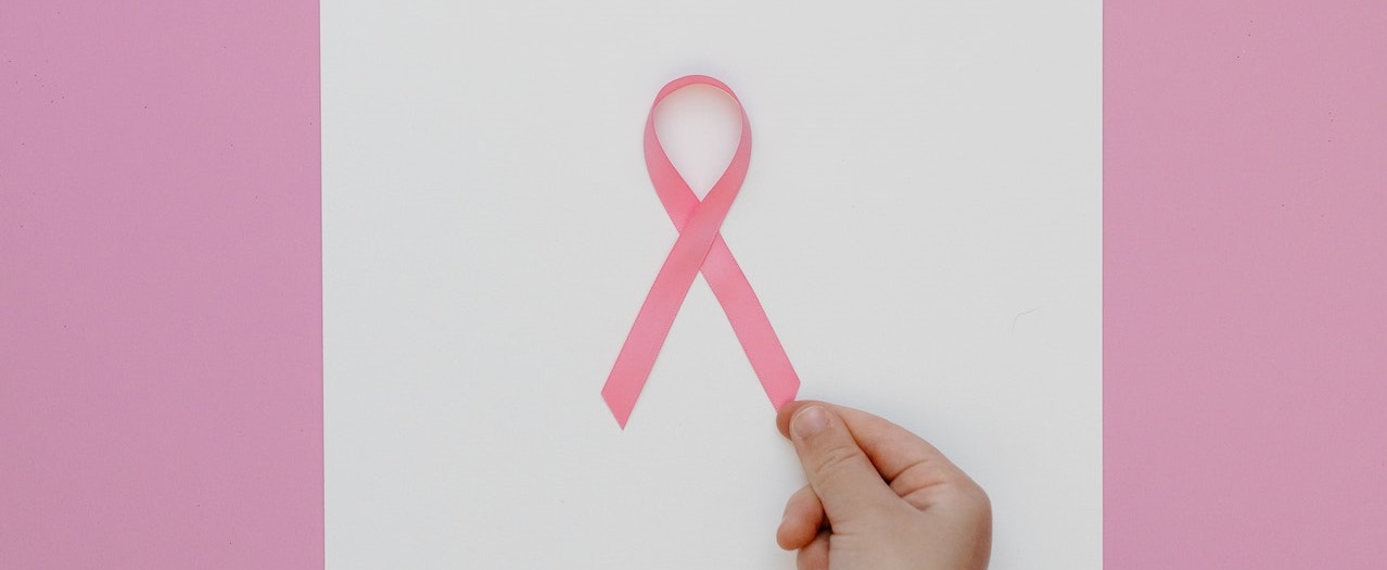 Pinkribbon in a bond paper | Breast Cancer Car Donations