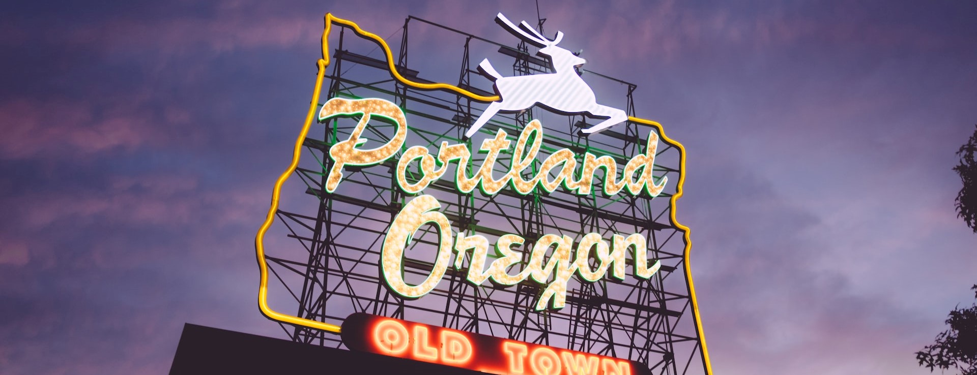 Portland Oregon Old Town neon signage during night time photo | Breast Cancer Car Donations