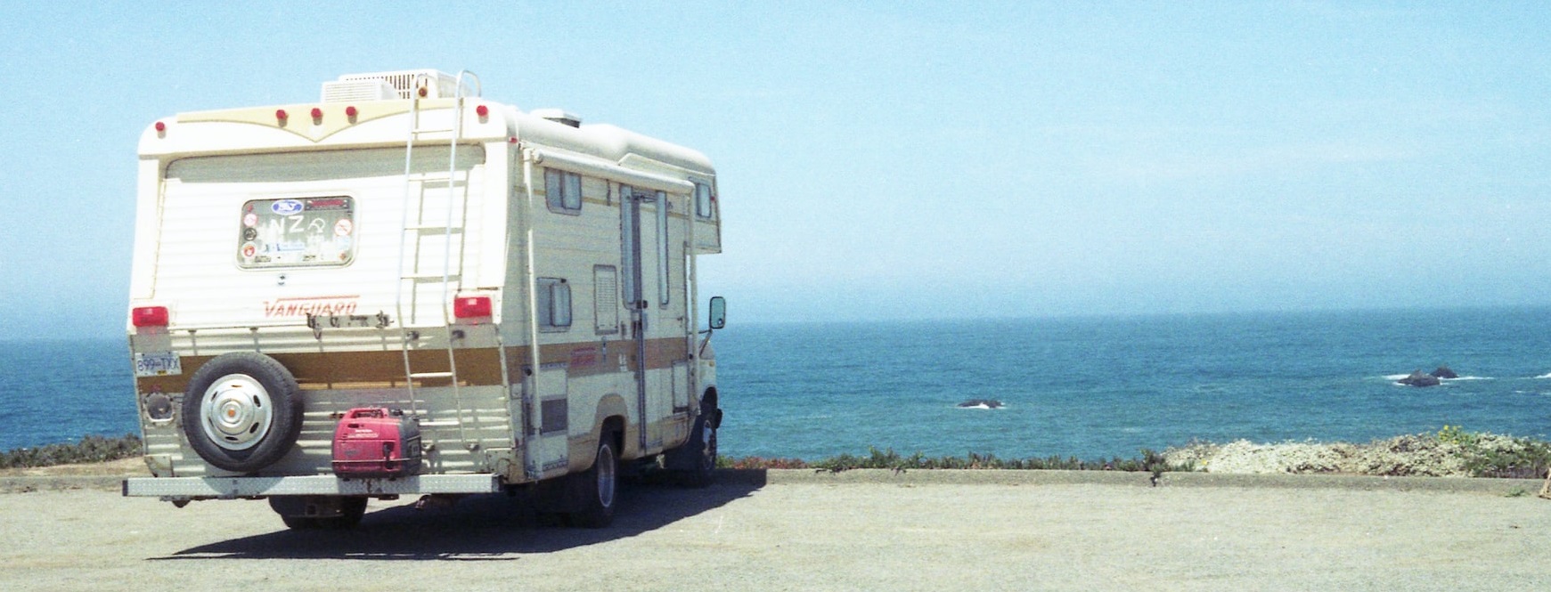 RV parked on beach | Breast Cancer Car Donations