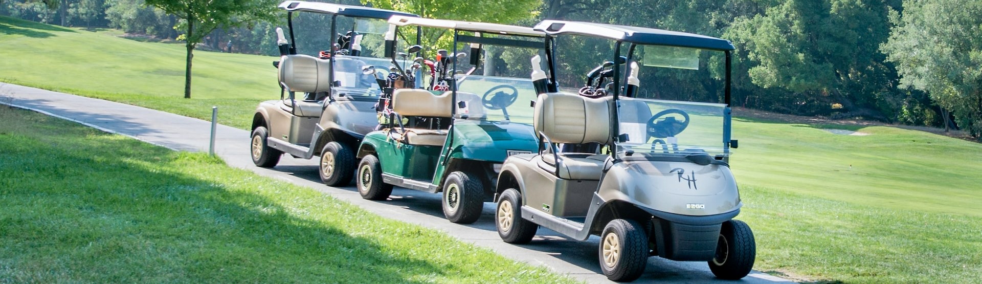 Three golf cart parked at the golf course | Breast Cancer Car Donations