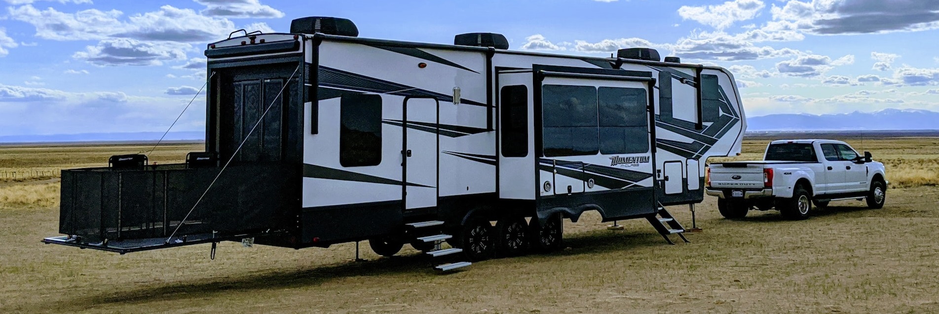 Toy Hauler RV parked with pick up truck | Breast Cancer Car Donations