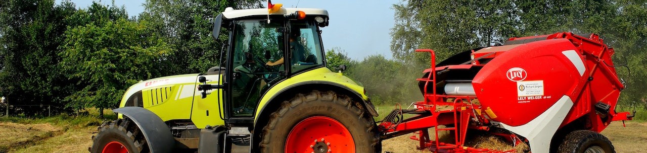 Tractor on Grass Field | Breast Cancer Car Donations