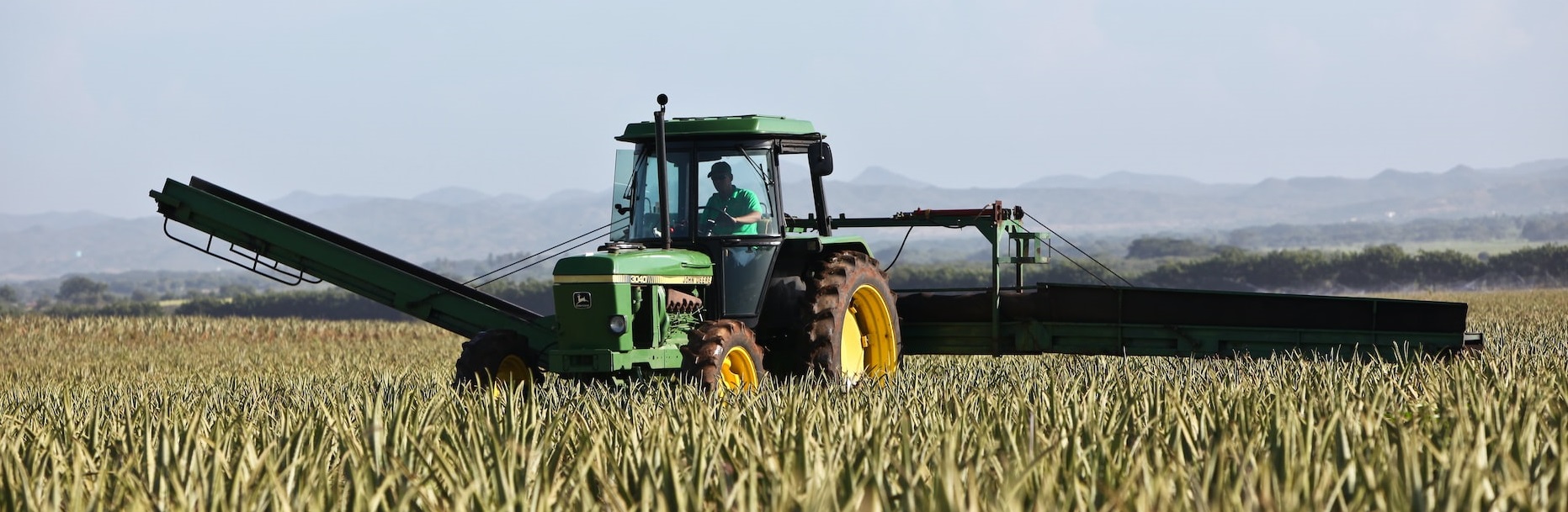 Tractor on field | Breast Cancer Car Donations