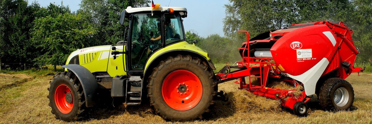 Tractor working on a field | Breast Cancer Car Donations