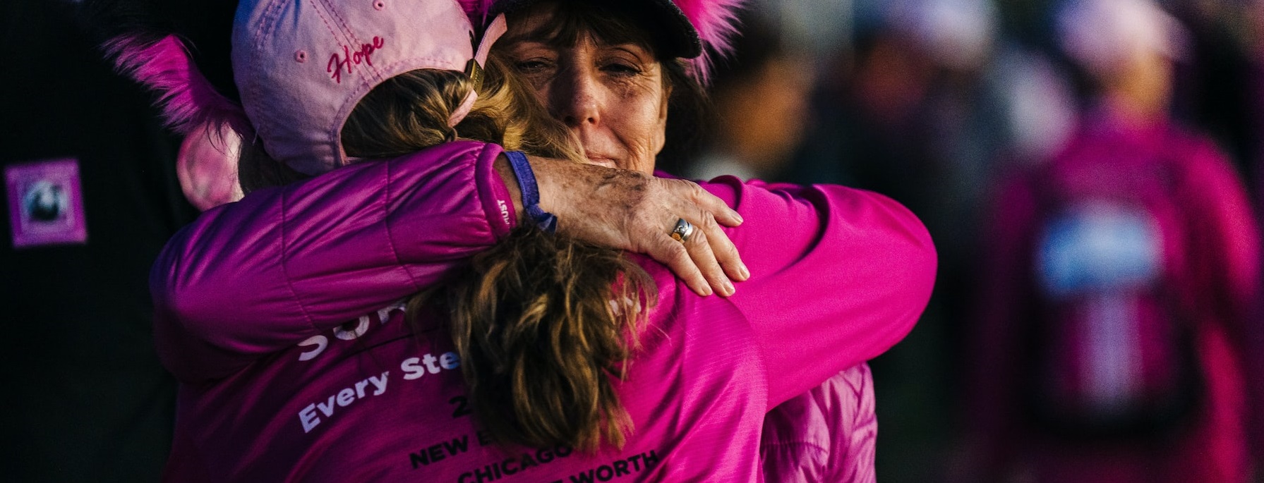 Two woman hugging | Breast Cancer Car Donations