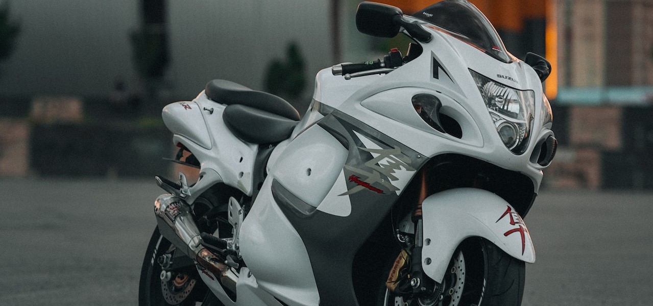 White Motorcycle under Evening Sky | Breast Cancer Car Donations